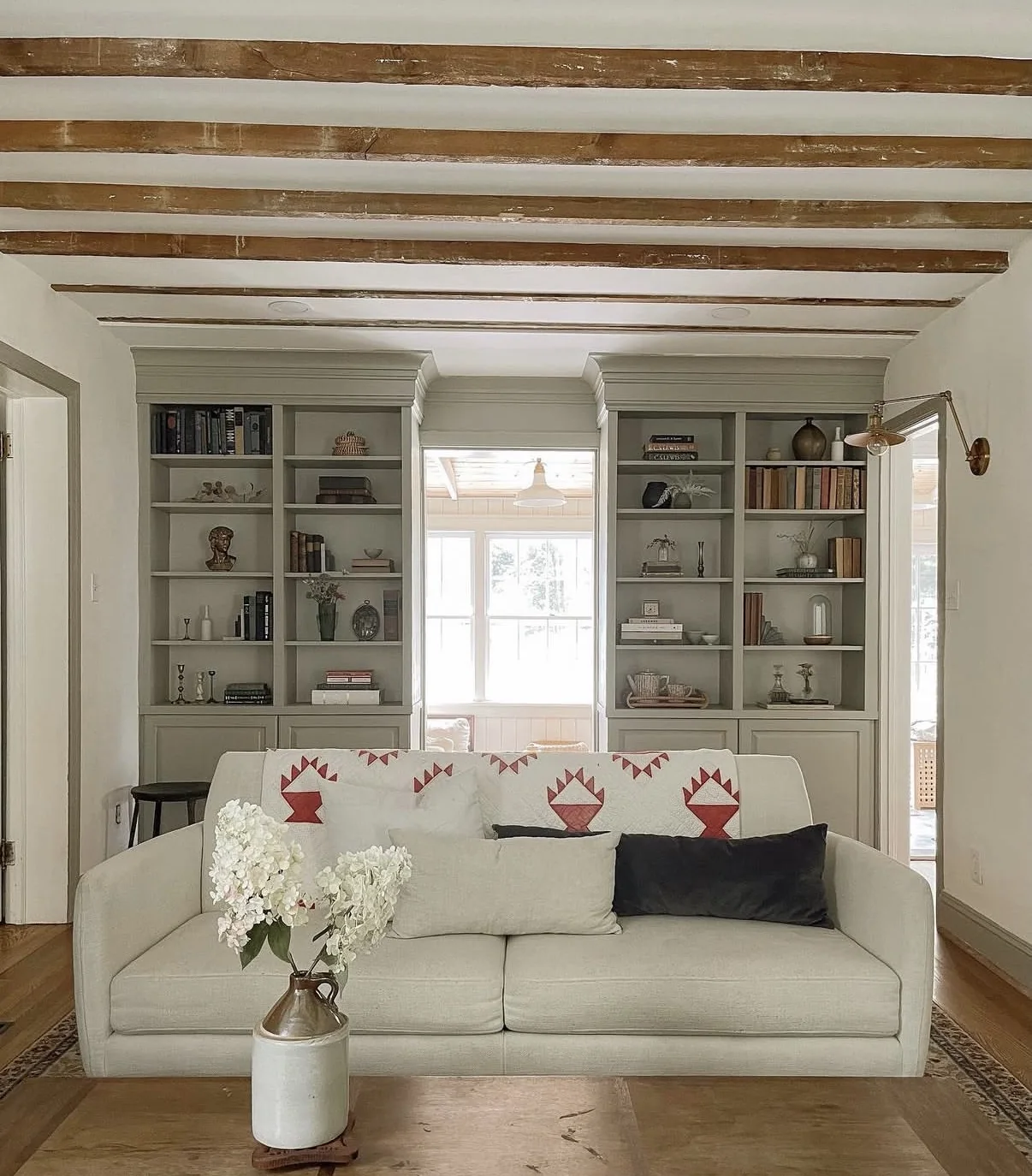 Completed room after water-damage restoration and custom finish work