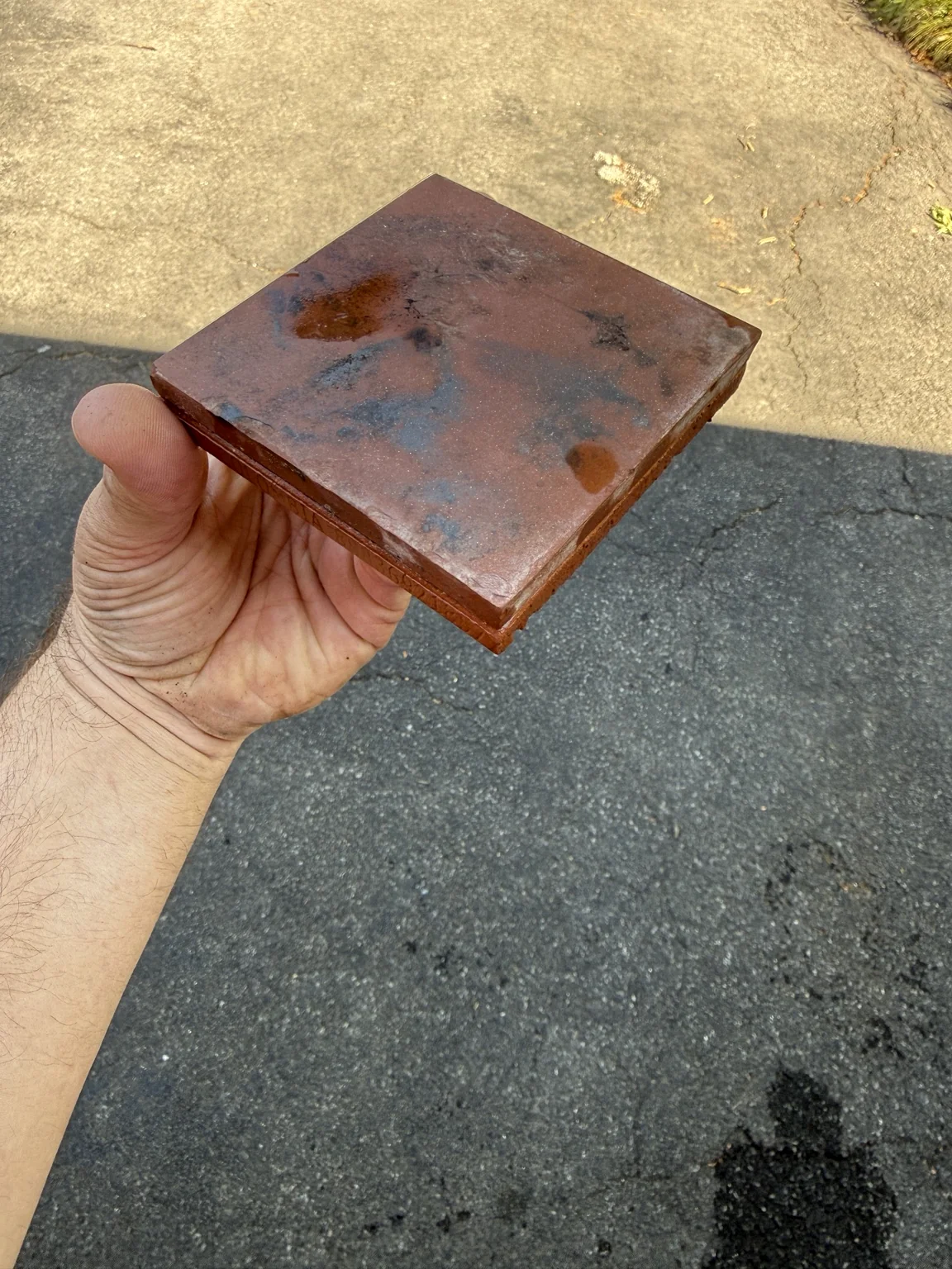 Custom-finished replacement tile matched to original aged fireplace tile